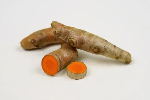 Turmeric root isolated on a white background Stock Photos