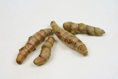 Turmeric root isolated on a white background Stock Photos