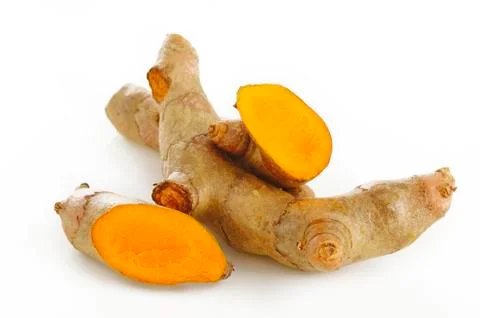 Turmeric root on white background Stock Photos