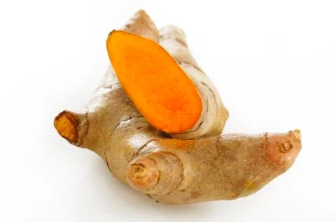 Turmeric root on white background Stock Photos