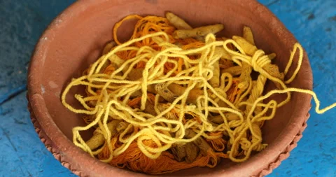 Turmeric Root with Yellow Thread Stock Footage 303882867