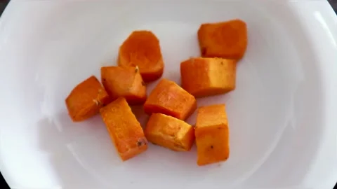 Turmeric slice isolated on a white plate Video stock 228898057