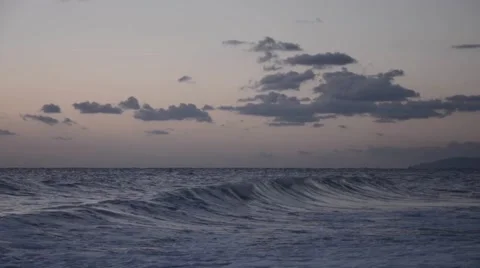 Turmoil of sea watching the sparse clumps of clouds Stock Footage 61919227