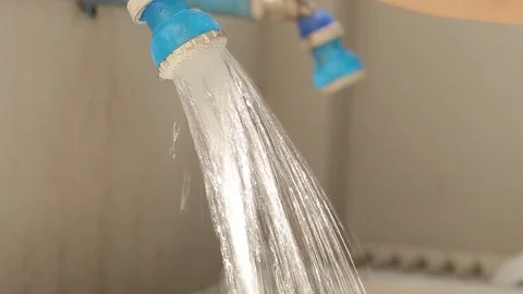 Turn on and off the faucet to help save water to be used throughout. Stock-Footage 76506287