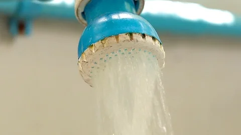Turn on and off the faucet to help save water to be used throughout. Stock Footage 76506850