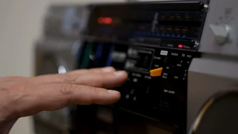 Turn on and turn off the old cassette player Stock Footage 122690678