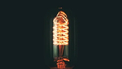 Turn on and turn off in slow motion, retro vintage light bulb with old tech Stock Footage 103049986