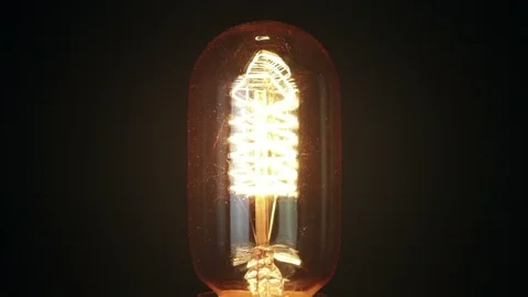 Turn on and turn off in slow motion, retro vintage light bulb with technology Stock-Footage 105636876