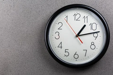 Turn back time - concept of turning clock backwards Foto stock