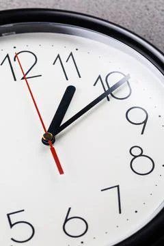 Turn back time - concept of turning clock backwards Foto stock