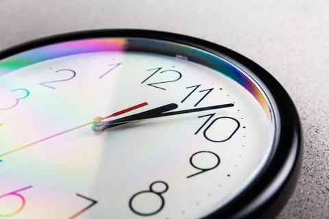 Turn back time - concept of turning clock backwards Foto stock