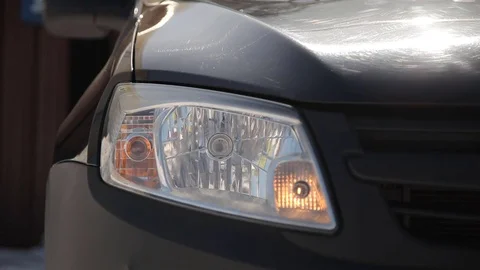 Turn on the car headlamp Stock Footage 73416204