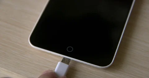 Turn on charging to the phone Stock-Footage 110786421