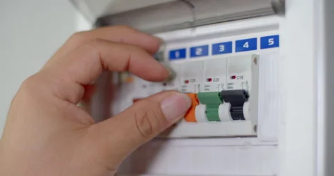 Turn on the circuit breaker.Turn on the circuit breakers of each room to work. Stock Footage 310907394