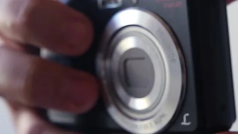 Turn on the compact camera Stock Footage 141290634