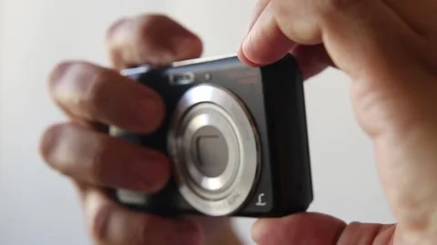Turn on the compact  fotocamera Stock Footage 141290633