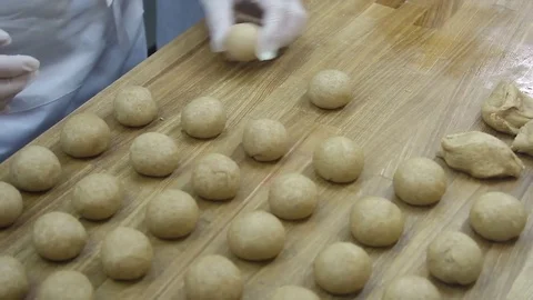 Turn the dough balls Stock-Footage 69993972
