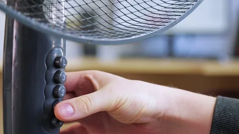 Turn the fan by hand Stock Footage 75259095