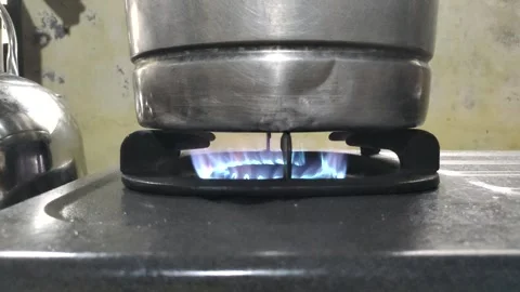 Turn Off The Flame of The Gas Stove Stock Footage 288113220