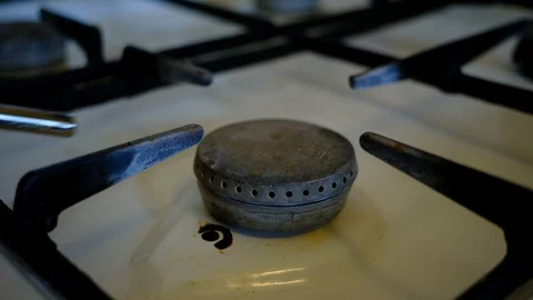 Turn on the gas burner Stock Footage 128457939