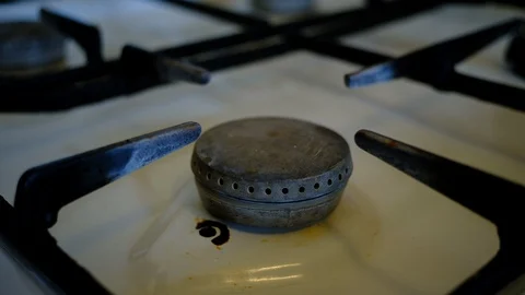 Turn on the gas burner Stock Footage 128458444