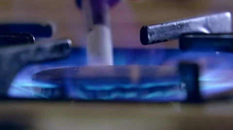 Turn on the gas stove. Sequence Stock Footage 8770414
