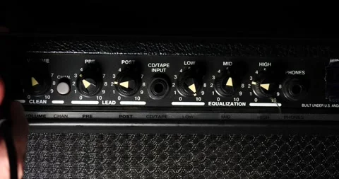 Turn on guitar amp plug in wire dolly camera movement Video stock 204900983