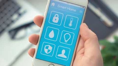 Turn off house security on smart home app on the smartphone Stock Footage 72360281