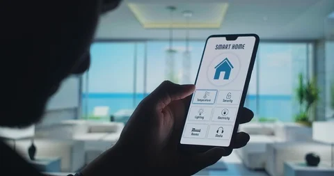 Turn off house security on smart home app on the smartphone. Mobile application Stock Footage 129220495