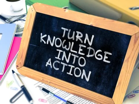 Turn Knowledge into Action Handwritten on Chalkboard Stock Illustration