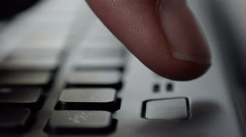 Turn on the laptop: press the "ON" button  Stock-Footage 56963800