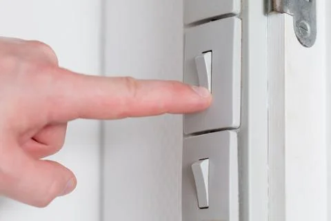 Turn off the light toggle switch. Saving energy in Denmark Copenhagen Stock Photos