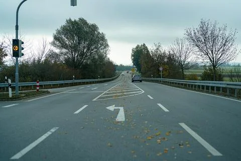 Turn markings at an intersection on a road. Stock Photos