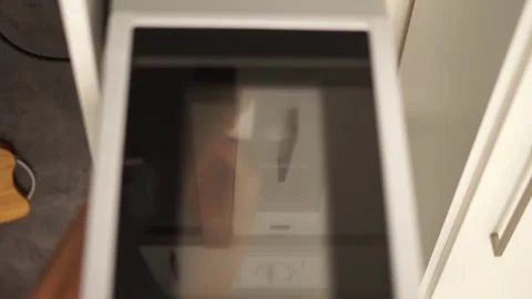 Turn on the microwave vertical video Stock Footage 257736811