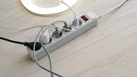 Turn off the neon strip and unplug socket from the extension cord 스톡 동영상 128229218