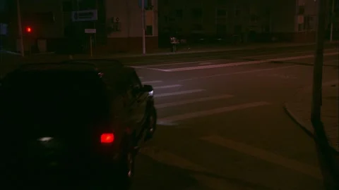 Turn at night intersection Stock Footage 235277943