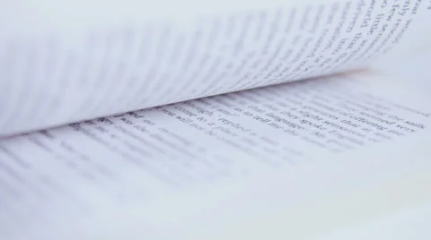 Turn pages of a book in slow motion Stock Footage 58761346