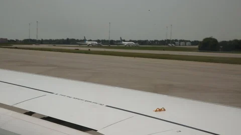 Turn of the plane on the runway Stock Footage 126590843