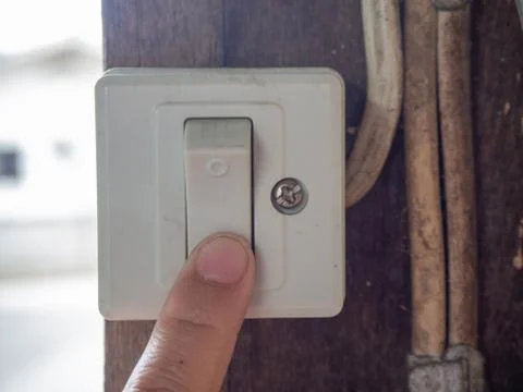 Turn off the power switch close-up. Stock Photos