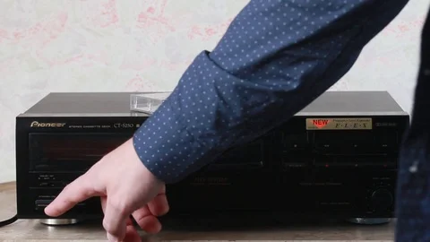 Turn on the recorder and insert the audio cassette Stock Footage 88963118