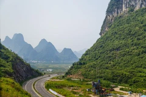 Turn the road between the mountains Stock Photos