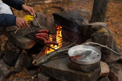 Turn the sausages Stock Photos