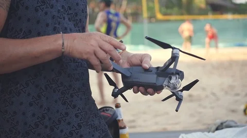 Turn off the screws of the drone, put it in the bag. HD, 1920x1080. slow motion Stock Footage 87913139