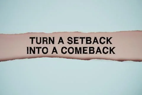Turn A Setback Into A Comeback text on pink with white paper torn ripped of.. Stock Photos