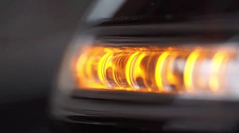 Turn signal light blinking on black car. Stock Footage 61193656