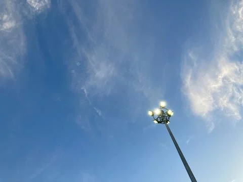 Turn-on spotlight post under the clear blue sky Stock Photos
