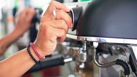 Turn on steamer espresso machine hands  close up slow motion 100fps Video stock 156252032