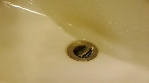 Turn on tap valve,Wash hands at Luxurious faucets toilets. Stock Footage