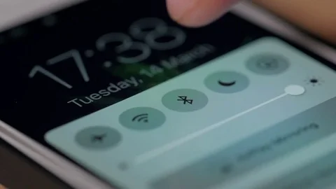 Turn off turn on Bluetooth on phone close up background Video stock 73677786