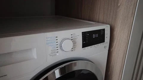 Turn on the washing machine in the house. Stock Footage 158276216